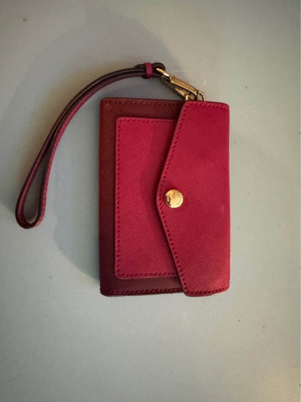 Michael Kors color-blocked Saffiano leather wristlet wallet in red/ fuschia